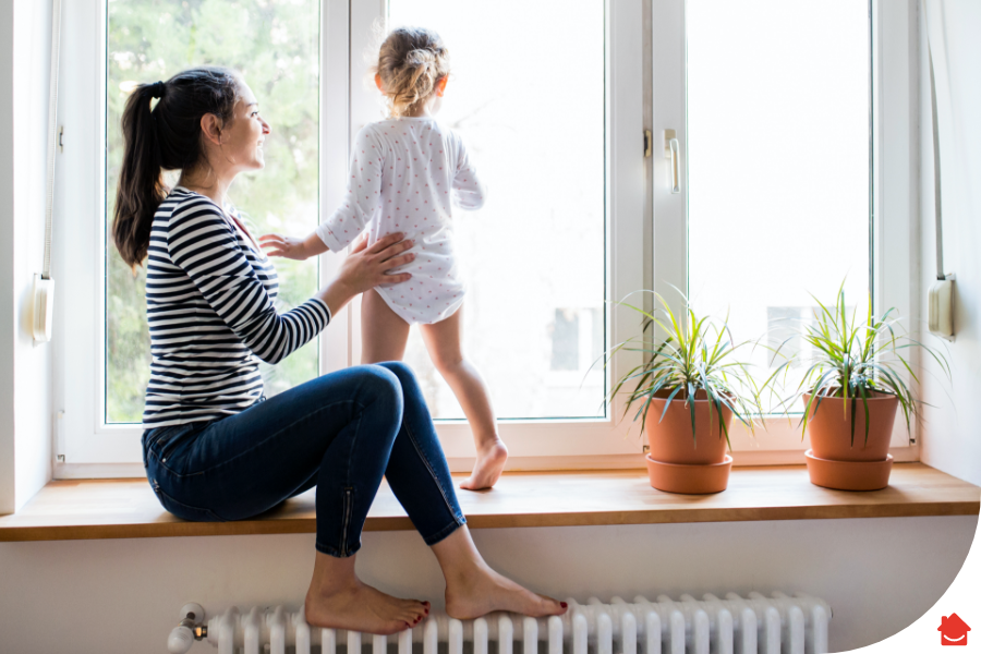 family in the window on top of there radiator - Central heating inhibitor explained