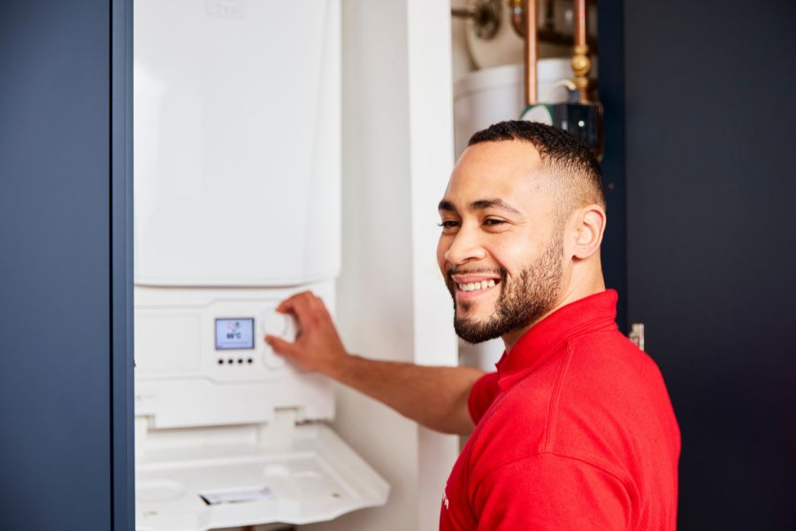 HomeServe Engineer fixing a problem for a customer that has boiler cover