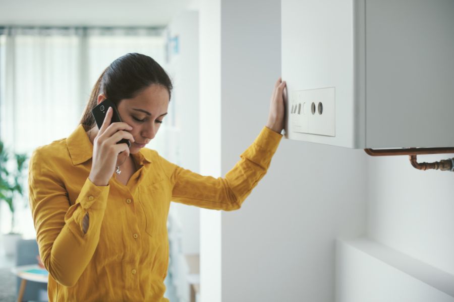 A person calling out for a home emergency repair after a boiler breakdown. 